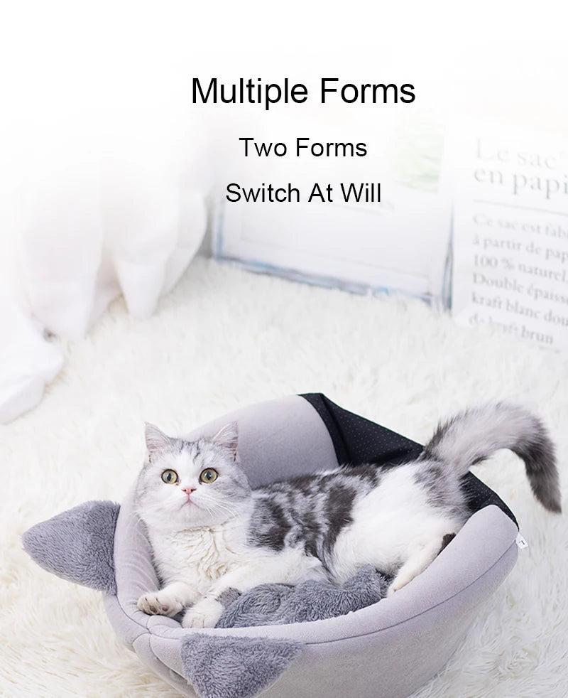 Transform your cat’s rest with a cozy, warm, and safe cat house. The semi‑closed design in a cute cat‑head shape provides comfort, protection, and non‑slip stability — perfect for all seasons. The ideal bed for cats who love to feel cared for.