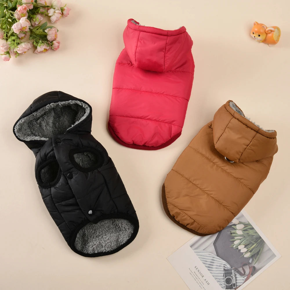 Keep your pet warm, dry and comfortable all winter. This thick, waterproof hooded jacket features soft fleece lining for cosy warmth, perfect for small and medium dogs or cats. Ideal for chilly walks and cold days.